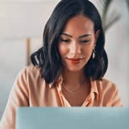 Woman looking at notebook